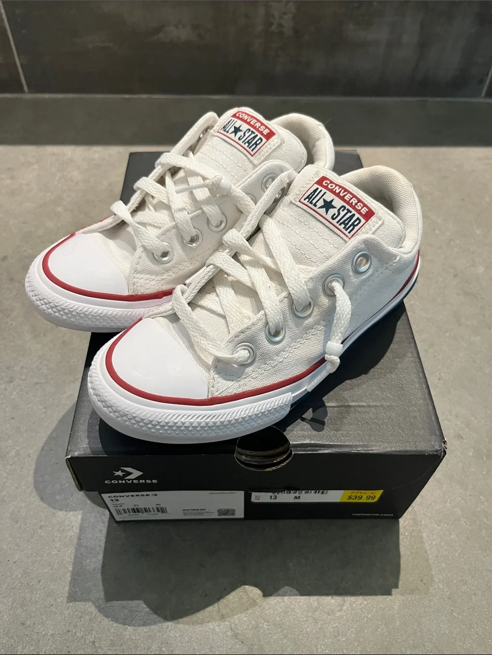 Converse Kids Low Top Sneakers in White with Red Trim
